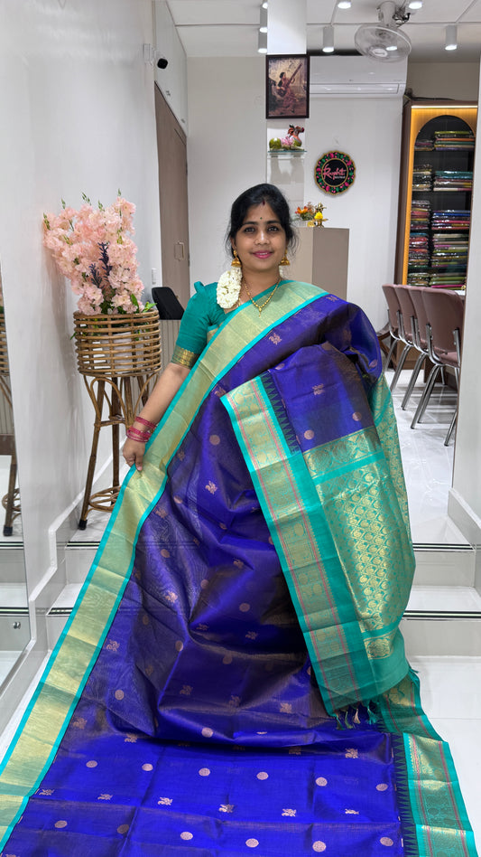 Vairoosi with Buttas Pure Silk Cotton Saree with Korvai Border